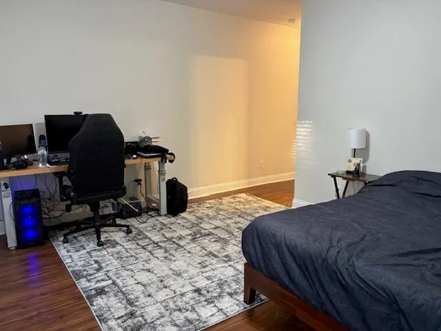 a view of a bathroom from a hallway