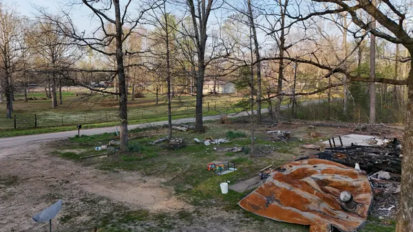 a view of backyard with green space