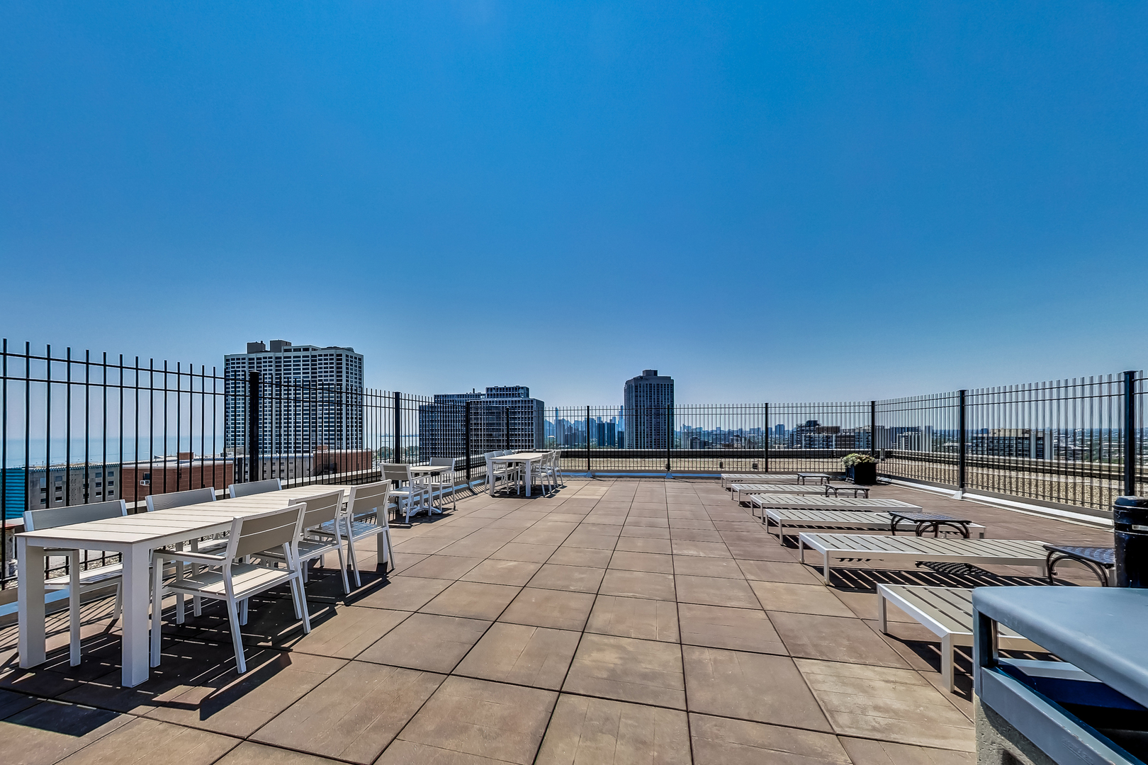 2930 North Sheridan Road, Unit 2111 Chicago, IL 60657 - Photo 17 of 31 a view of a terrace with chairs