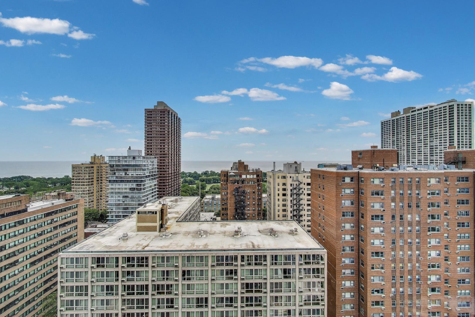 2930 North Sheridan Road, Unit 2111 Chicago, IL 60657 - Photo 2 of 31 a view of a city with tall buildings