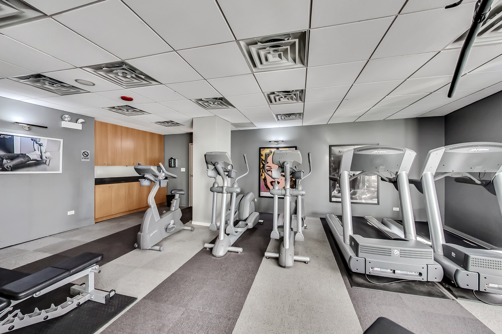 2930 North Sheridan Road, Unit 2111 Chicago, IL 60657 - Photo 28 of 31 a view of a room with gym equipment