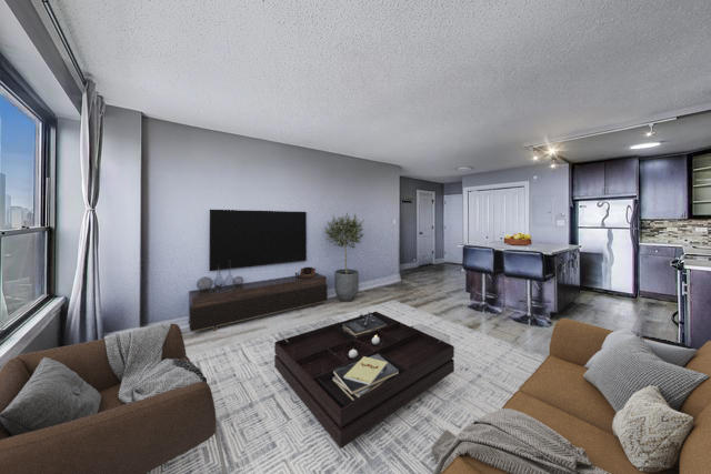 2930 North Sheridan Road, Unit 2111 Chicago, IL 60657 - Photo 8 of 31 a living room with furniture and a flat screen tv