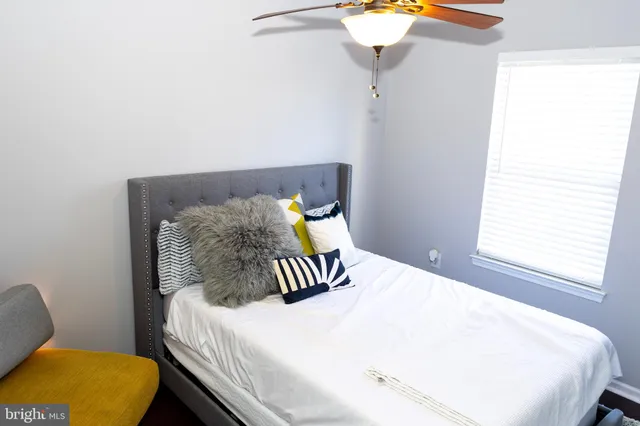 a bathroom with a sink vanity and a mirror