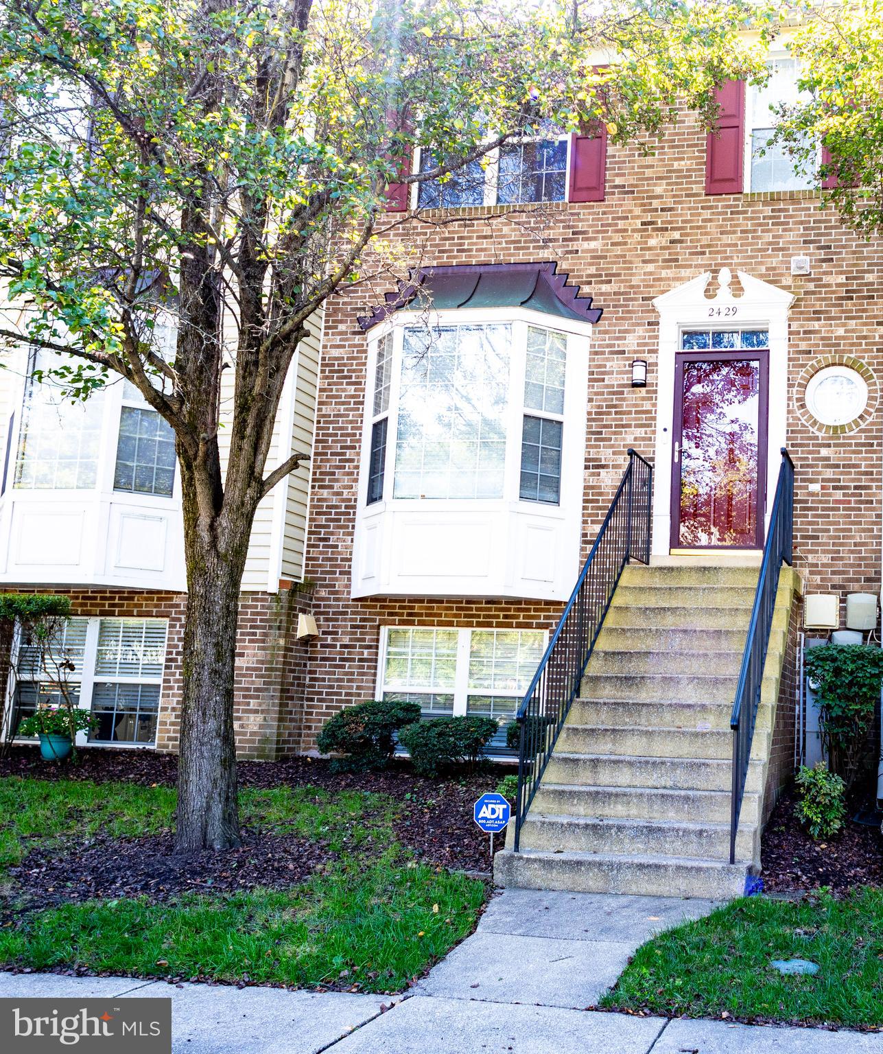 2429 Lizbec Court Crofton, MD 21114 - Photo 2 of 31 a front view of a house with a yard