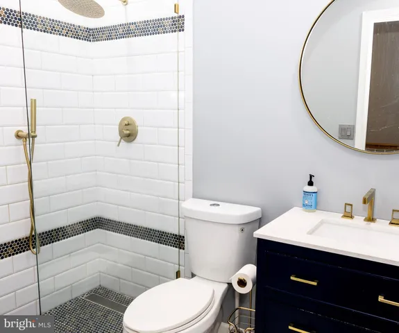 a view of a room that has a table and chairs