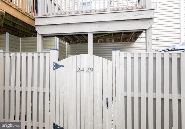 a view of a park with large trees