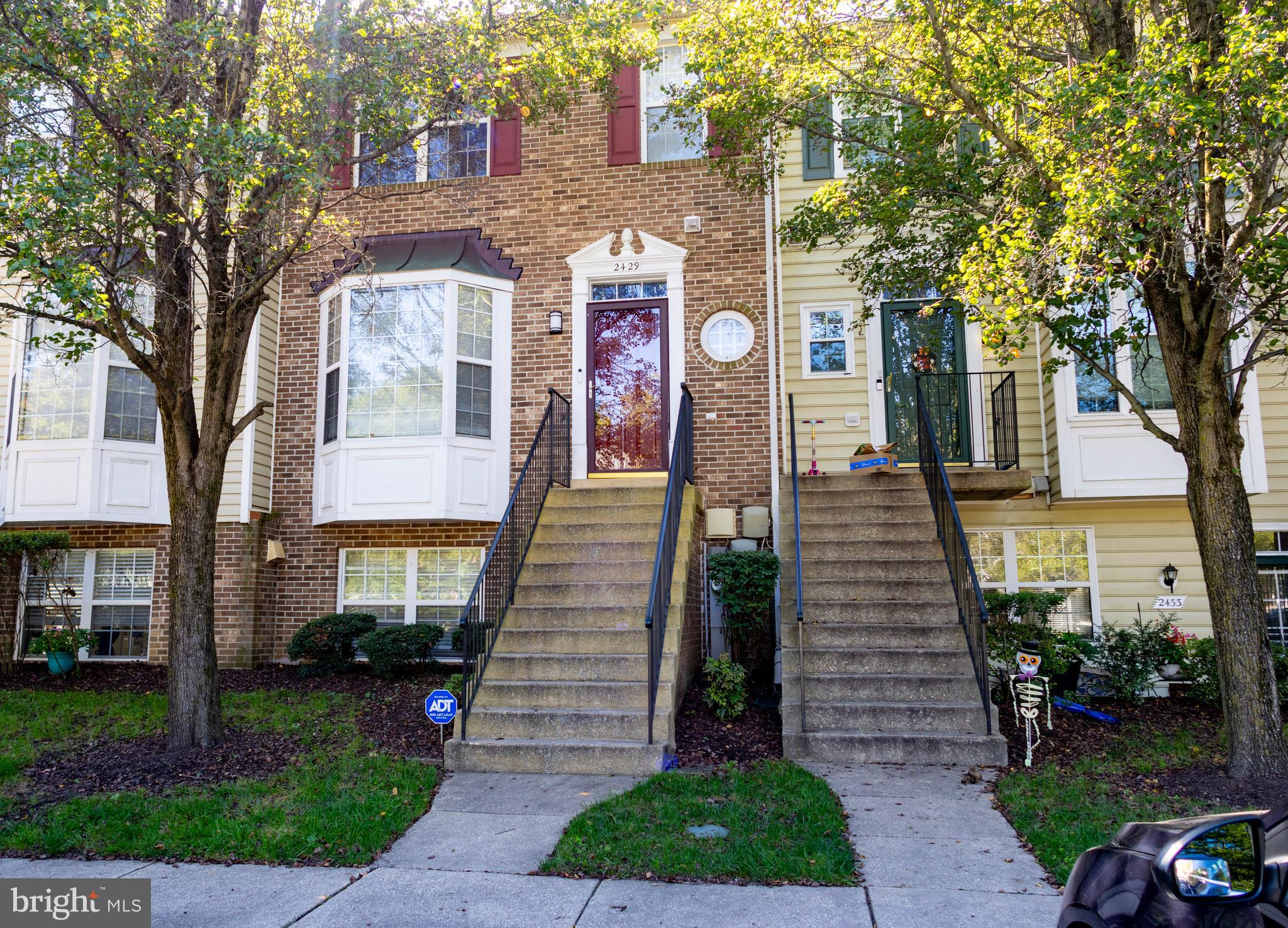 2429 Lizbec Court Crofton, MD 21114 - Photo 30 of 31 a front view of a house with garden