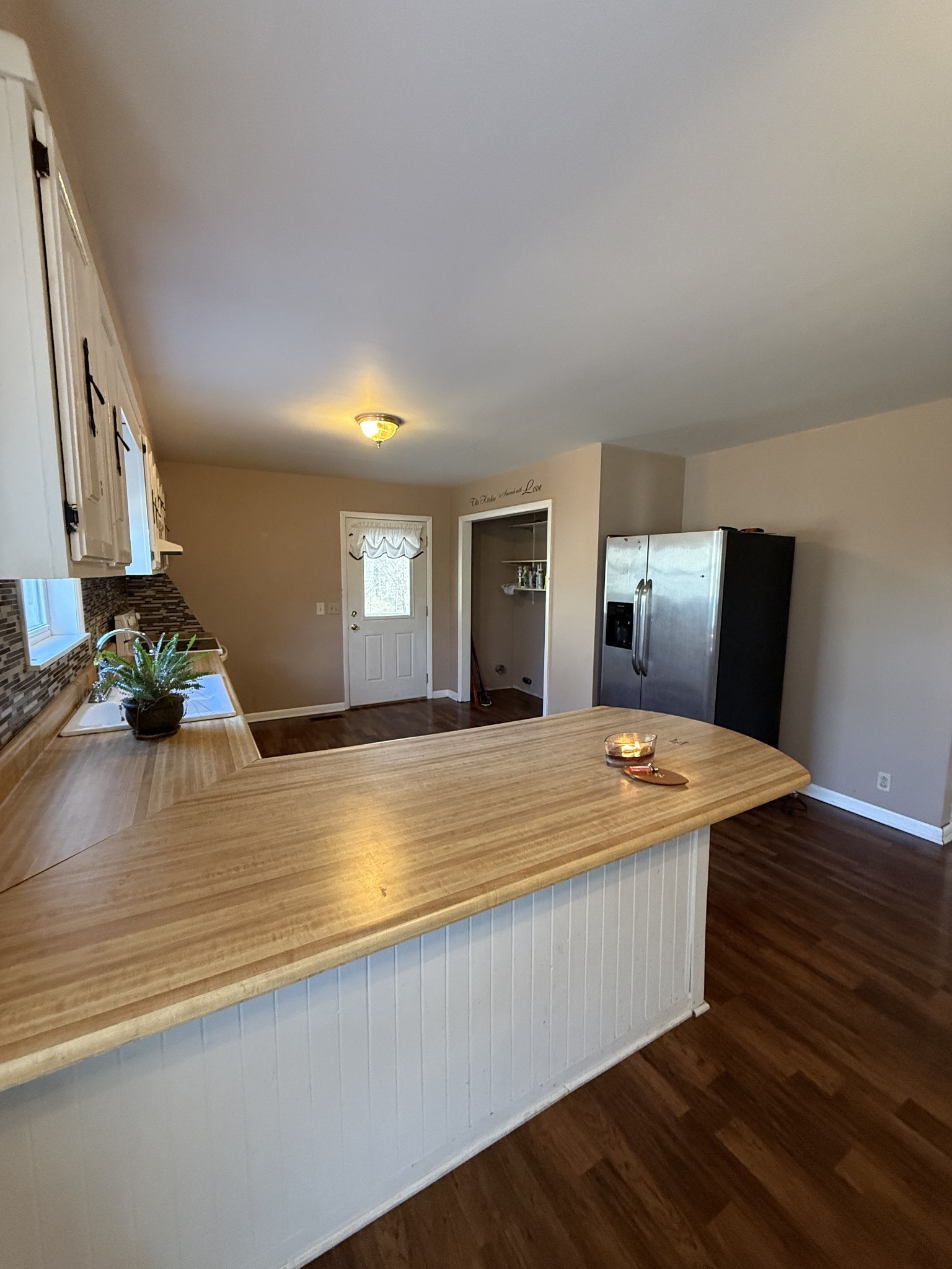 2352 Spring Creek Road Lafayette, TN 37083 - Photo 7 of 11 a room with a bed and a flat screen tv