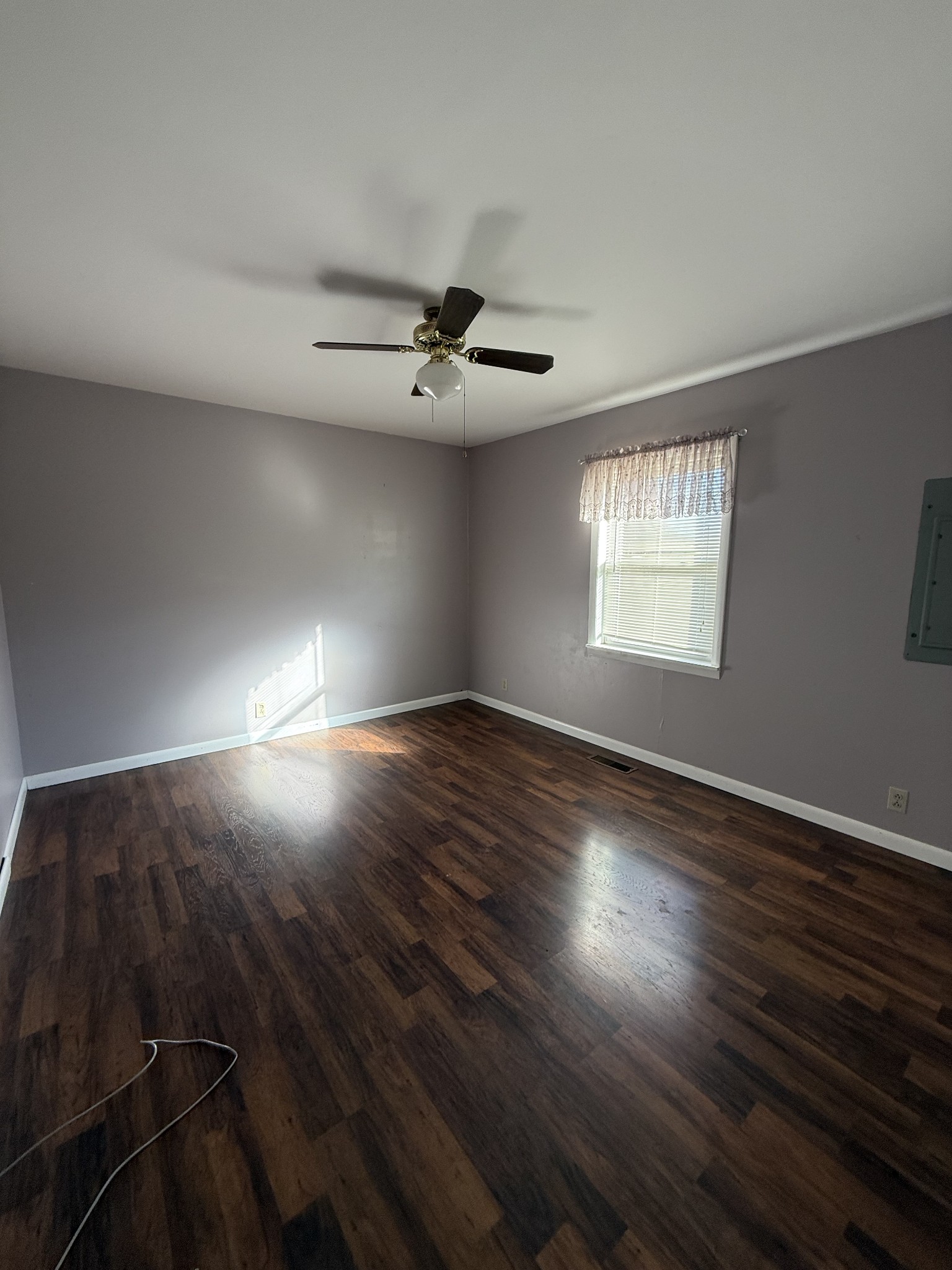 2352 Spring Creek Road Lafayette, TN 37083 - Photo 9 of 11 a view of wooden floor and windows in a room