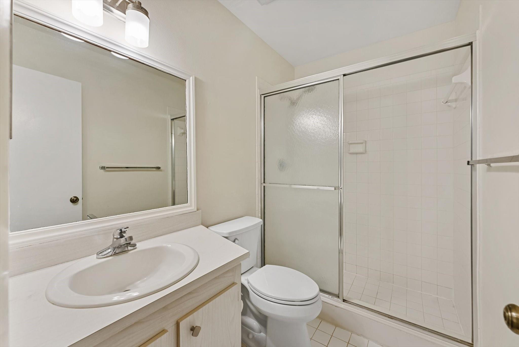 160 Northwest 70th Street, Unit 204 Boca Raton, FL 33487 - Photo 17 of 31 a bathroom with a sink and a toilet