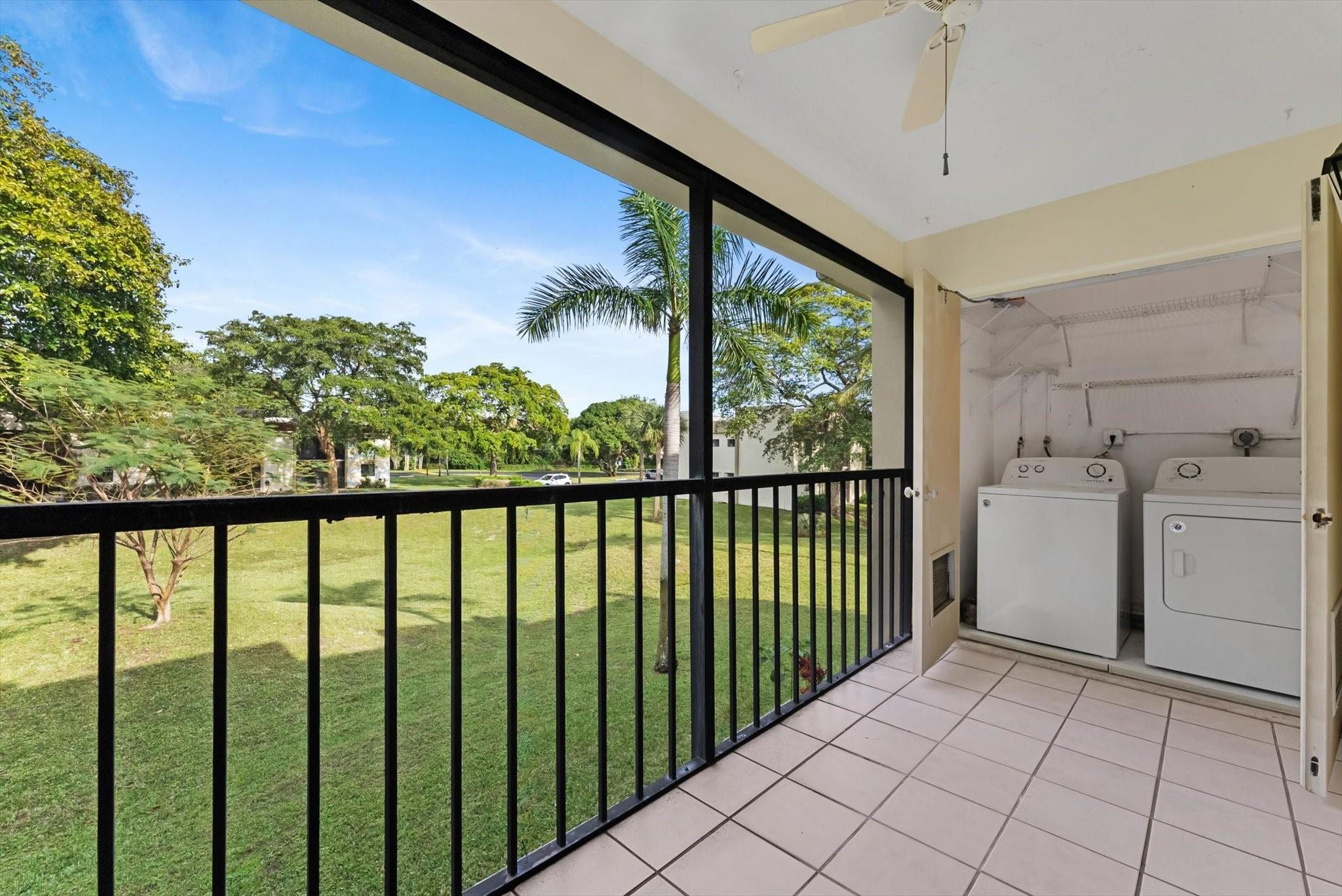 160 Northwest 70th Street, Unit 204 Boca Raton, FL 33487 - Photo 22 of 31 a view of a balcony with wooden floor