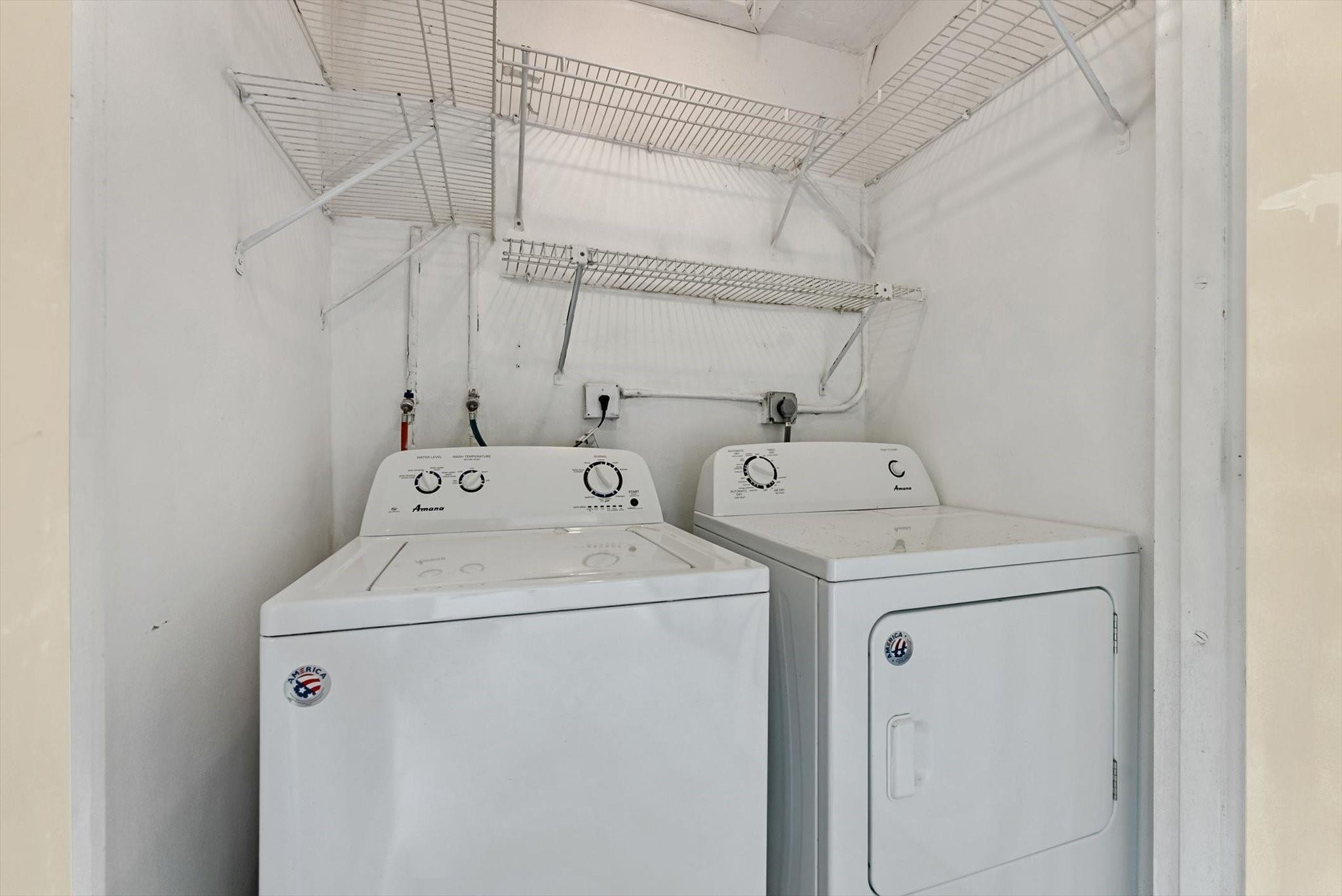 160 Northwest 70th Street, Unit 204 Boca Raton, FL 33487 - Photo 23 of 31 a utility room with dryer and washer
