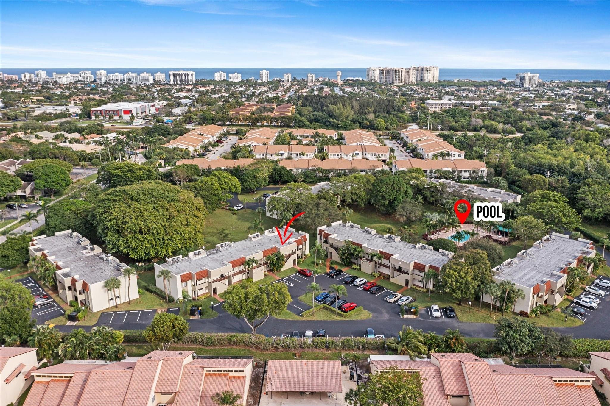 160 Northwest 70th Street, Unit 204 Boca Raton, FL 33487 - Photo 7 of 31 an aerial view of residential houses with outdoor space