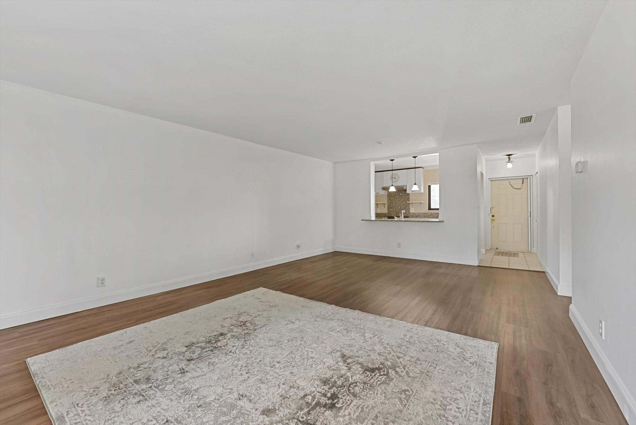 160 Northwest 70th Street, Unit 204 Boca Raton, FL 33487 - Photo 10 of 31 an empty room with a empty space and window