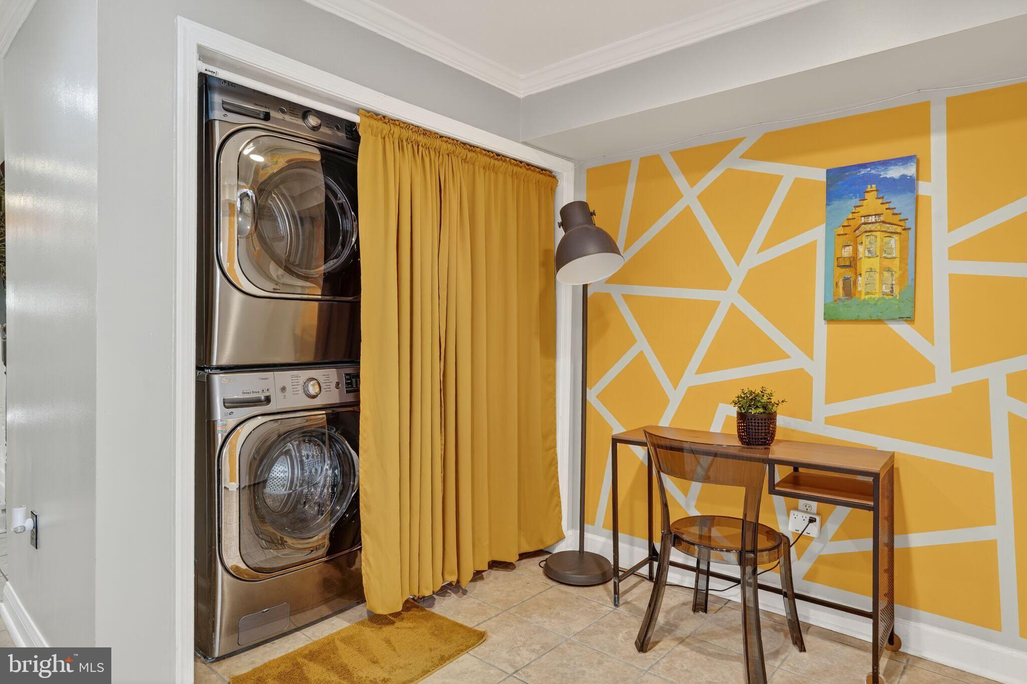 1337 Harvard Street Northwest, Unit 1 Washington, DC 20009 - Photo 18 of 20 a utility room with dryer and washer
