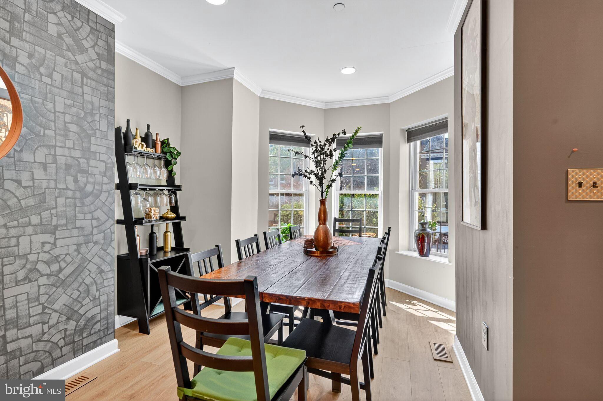 1337 Harvard Street Northwest, Unit 1 Washington, DC 20009 - Photo 5 of 20 a view of a dining room with furniture and window