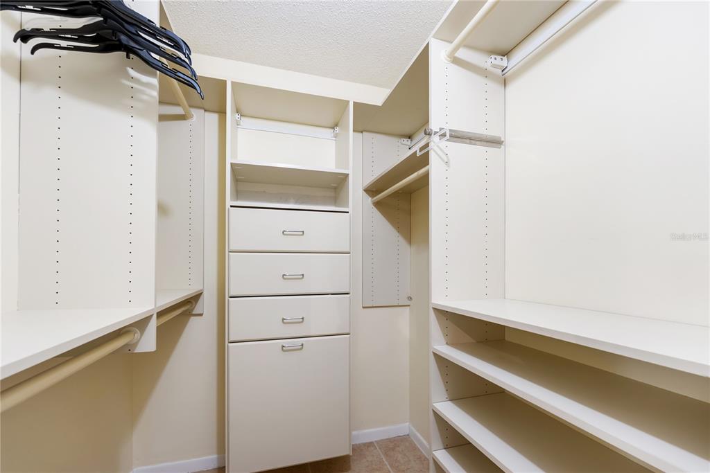 7351 West Country Club Drive North, Unit 103 Sarasota, FL 34243 - Photo 17 of 26 a view of walk in closet