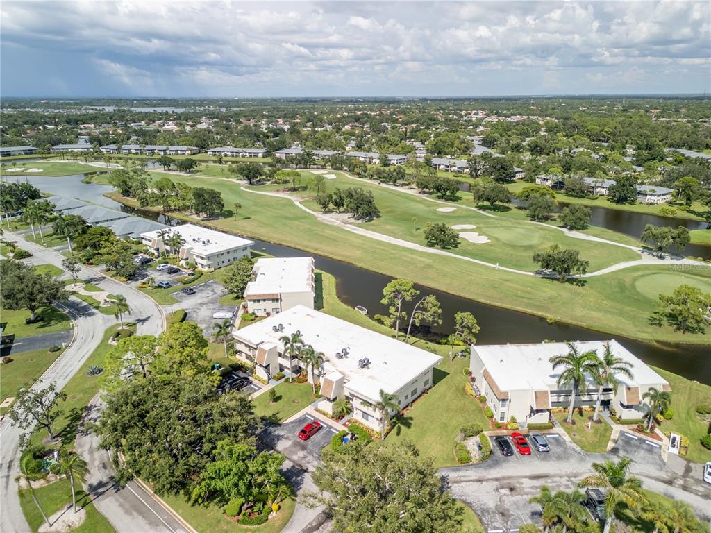 7351 West Country Club Drive North, Unit 103 Sarasota, FL 34243 - Photo 25 of 26 a view of lake view