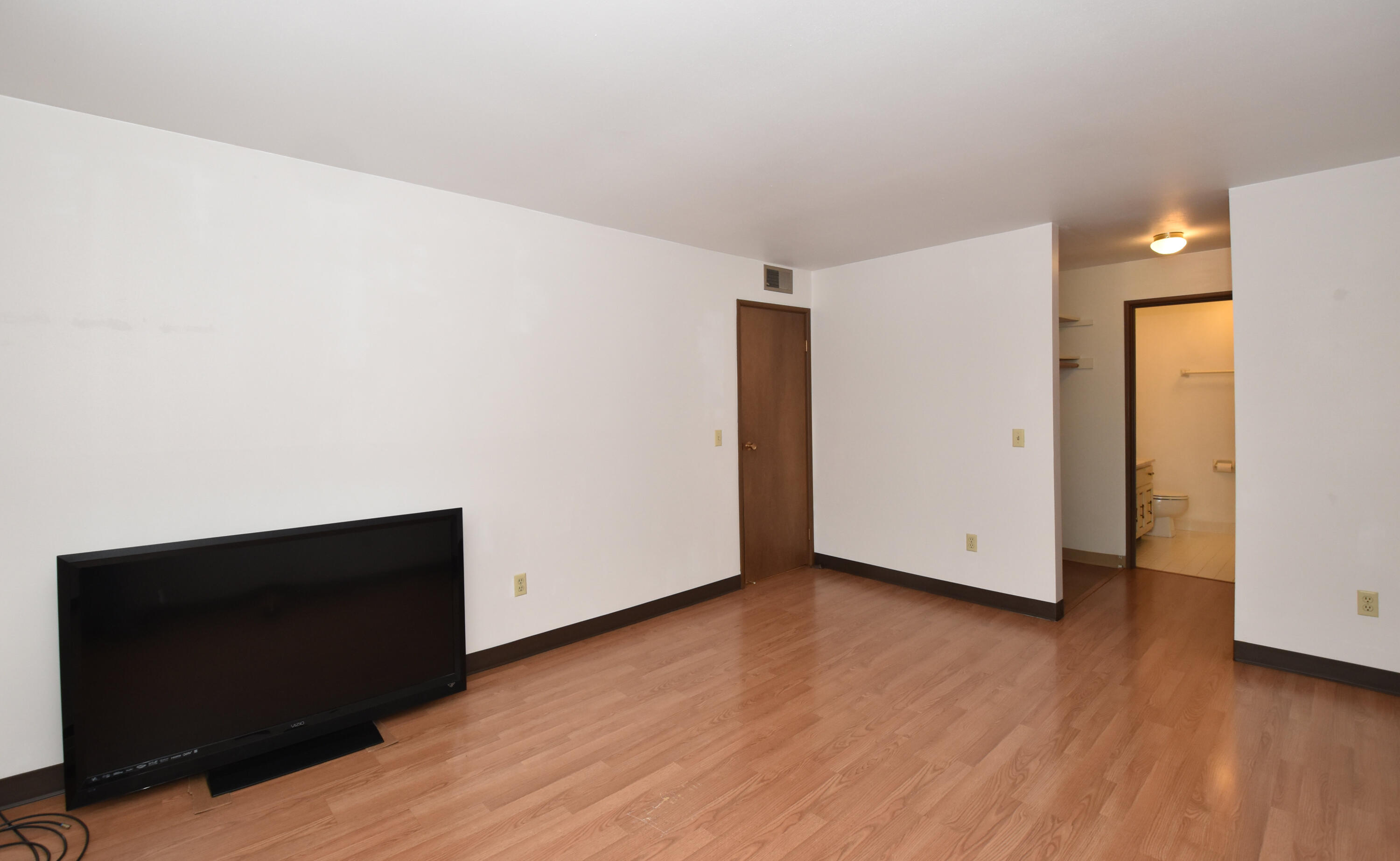 5253 North Lovers Lane Road, Unit 219 Milwaukee, WI 53225 - Photo 15 of 39 Primary Bedroom