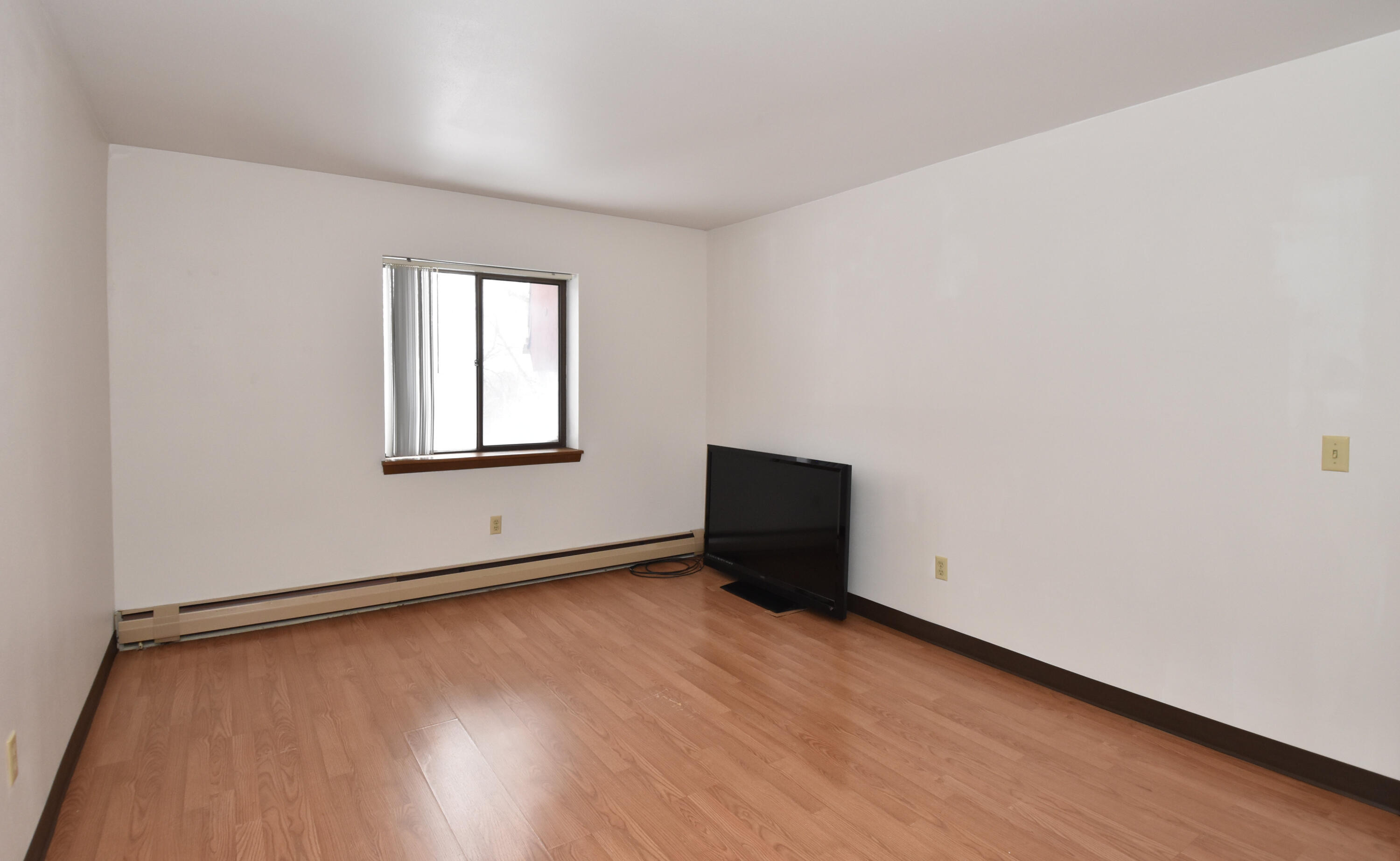 5253 North Lovers Lane Road, Unit 219 Milwaukee, WI 53225 - Photo 16 of 39 Primary Bedroom