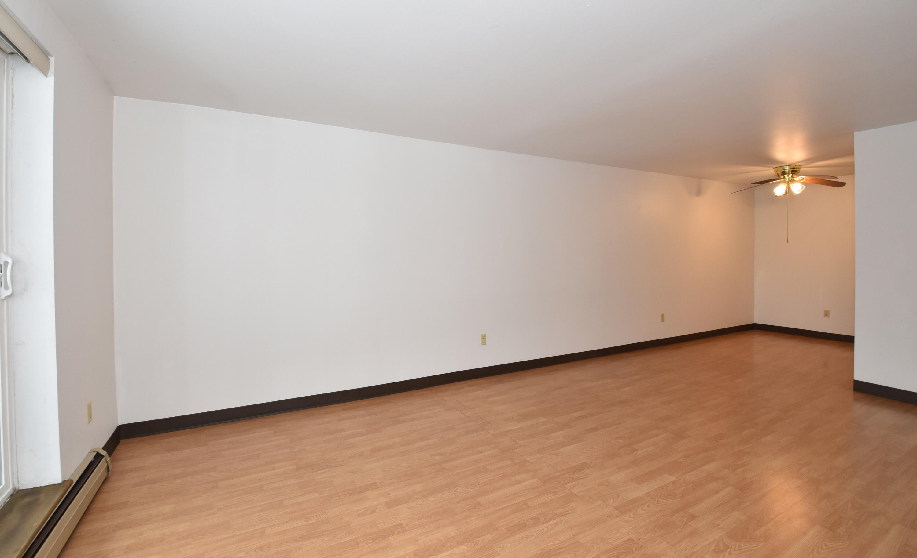 5253 North Lovers Lane Road, Unit 219 Milwaukee, WI 53225 - Photo 5 of 39 Living Room into DR