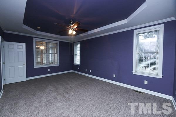 1008 Fieldgrass Place Raleigh, NC 27603 - Photo 6 of 13 a view of an empty room with a window