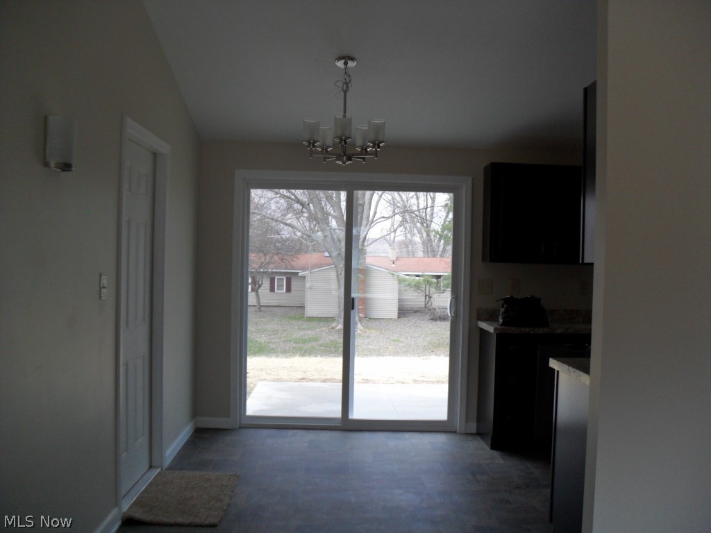 3125 Polly Road Ravenna, OH 44266 - Photo 9 of 34 Eating area with NEW lighting, paint, flooring, & trim.