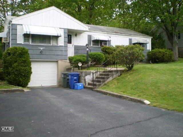 21 Ridgevale Place Bridgeport, CT 06610 - Photo 1 of 1 a view of a house with backyard and garden