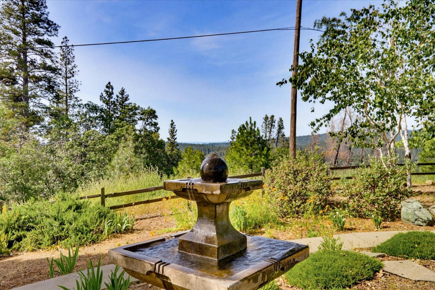 970 Morgan Ranch Drive Grass Valley, CA 95945 - Photo 43 of 76 a view of a fountain in a yard