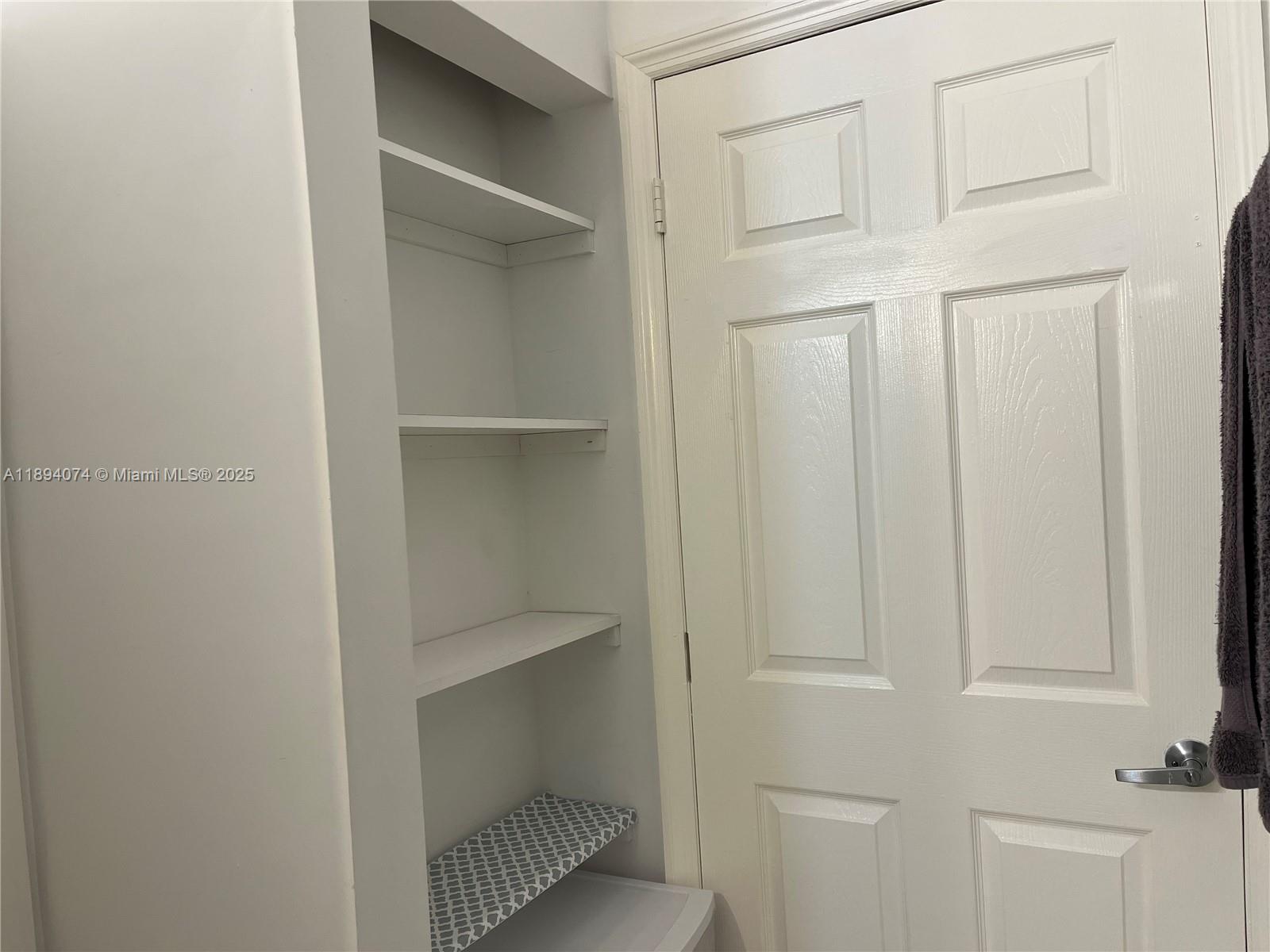 1020 Southwest 4th Street, Unit 103 Miami, FL 33130 - Photo 8 of 11 a view of an empty walk in closet