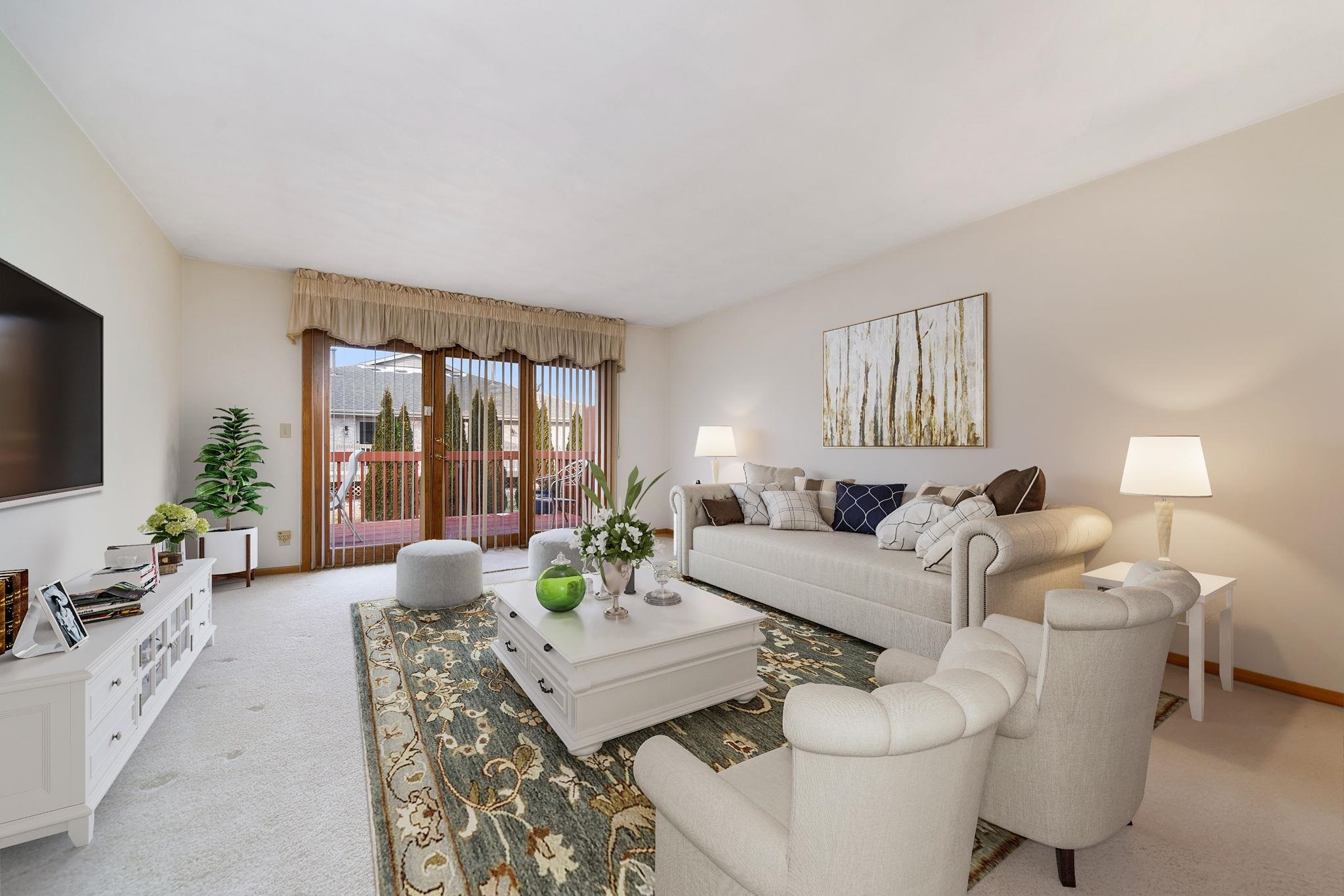 1196 South Trainer Road Rockford, IL 61108 - Photo 13 of 33 a living room with furniture and a flat screen tv