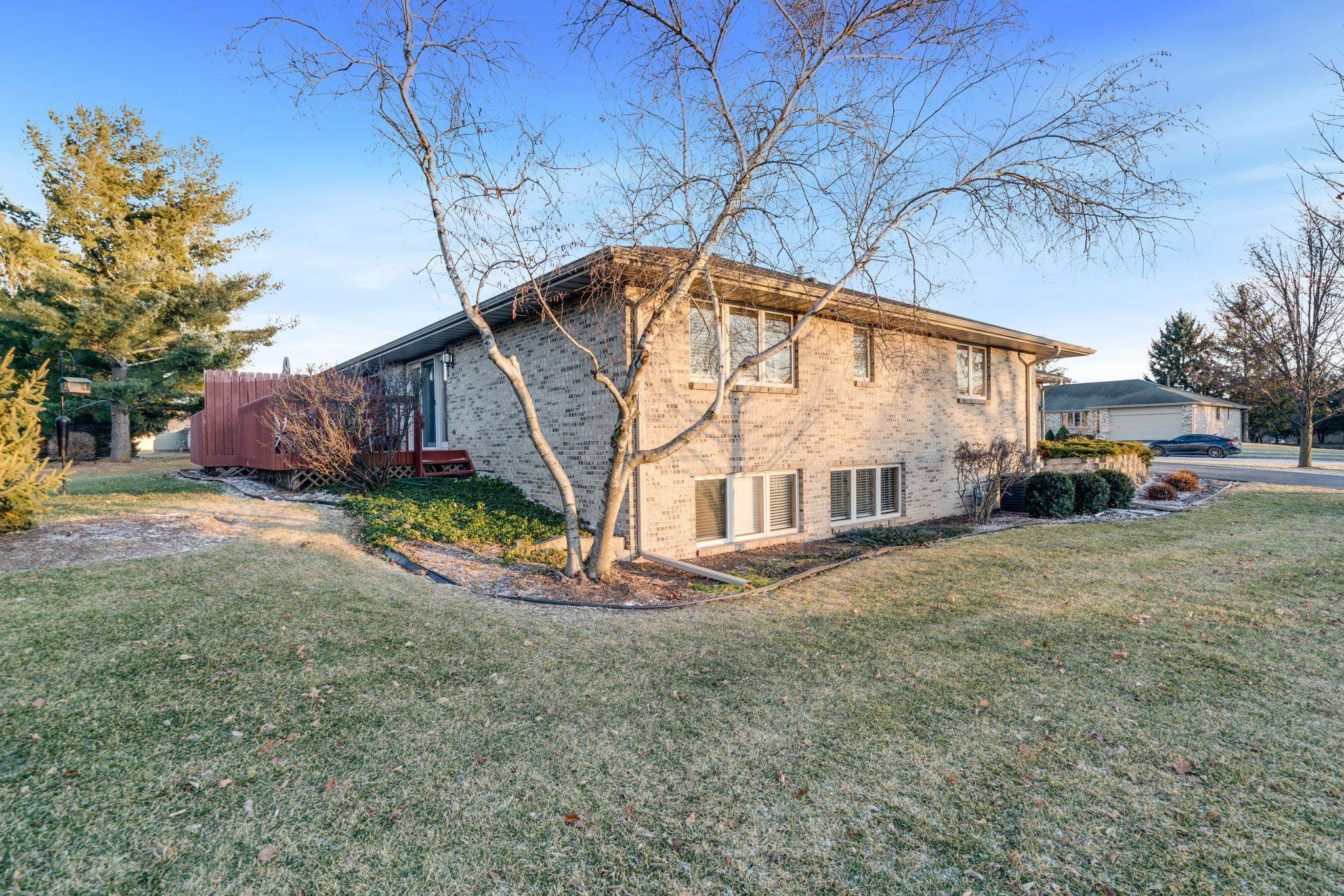 1196 South Trainer Road Rockford, IL 61108 - Photo 32 of 33 a view of a house with a yard