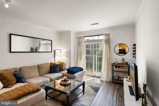 a view of a balcony with wooden floor
