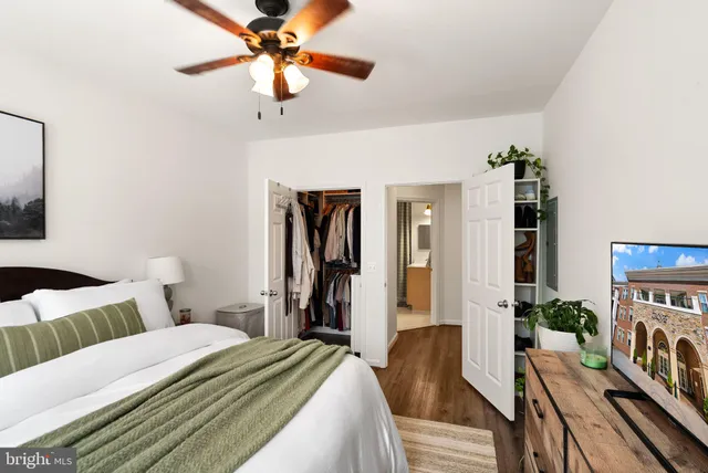a bathroom with a sink vanity and a mirror