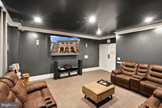 a view of swimming pool with outdoor seating