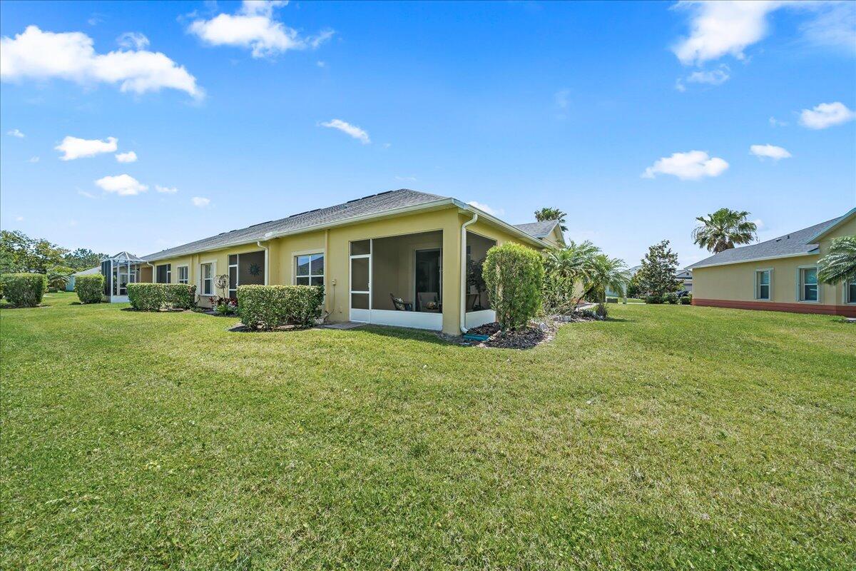 3795 Sansome Circle Melbourne, FL 32940 - Photo 24 of 76 a view of a house with backyard and garden