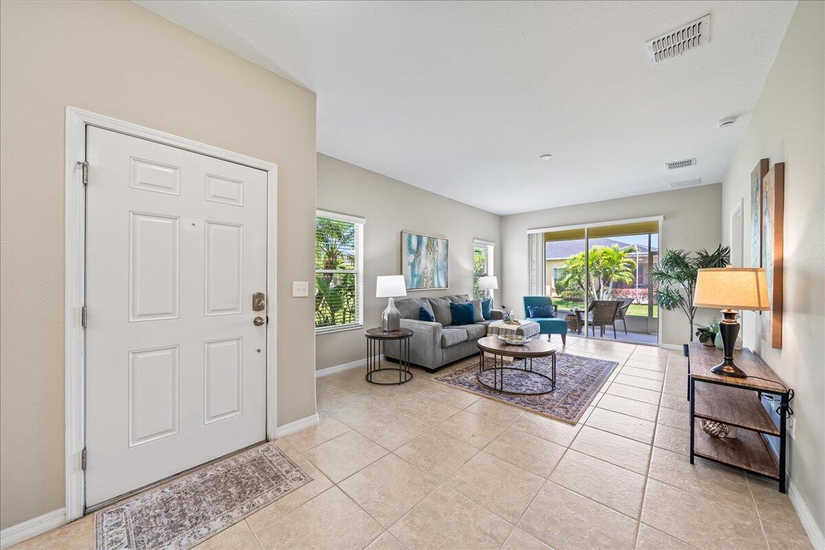 3795 Sansome Circle Melbourne, FL 32940 - Photo 5 of 76 a living room with furniture and a window