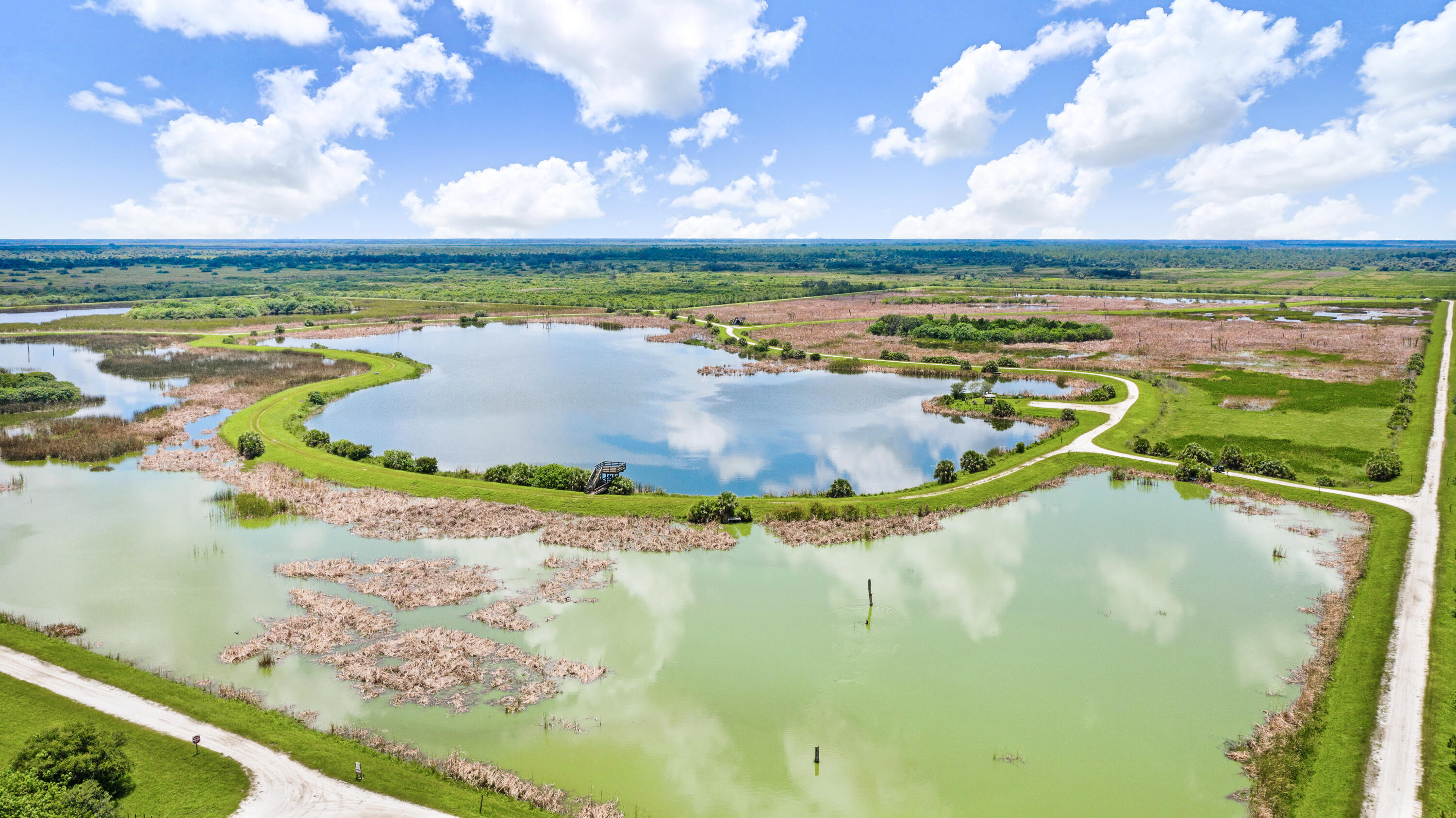 3795 Sansome Circle Melbourne, FL 32940 - Photo 55 of 76 a view of a lake with a yard