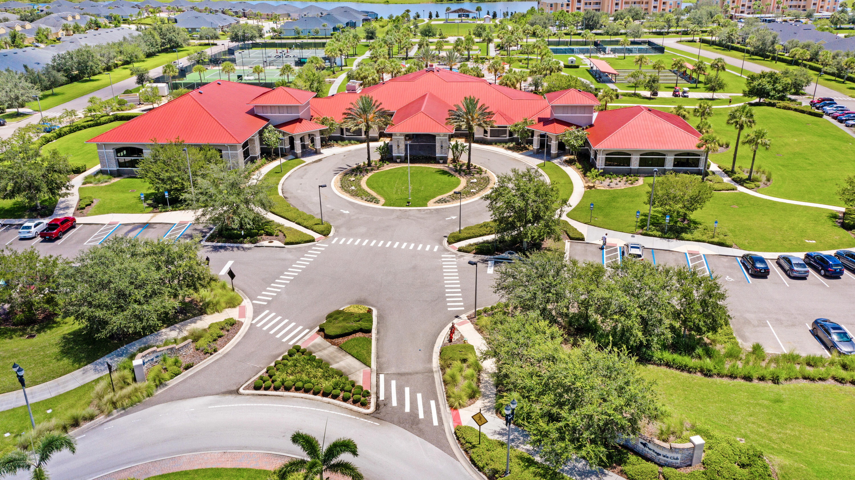 3795 Sansome Circle Melbourne, FL 32940 - Photo 74 of 76 an aerial view of a house with a yard and lake view