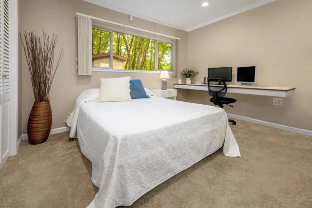 a view of room with furniture and closet