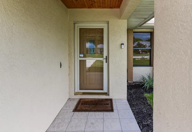 a view of a entrance door of the house