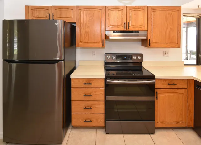 a kitchen with a large window