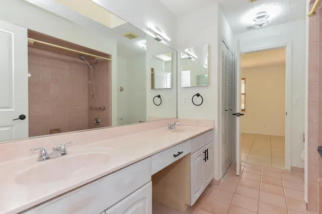 a bath room with a toilet and a bath tub