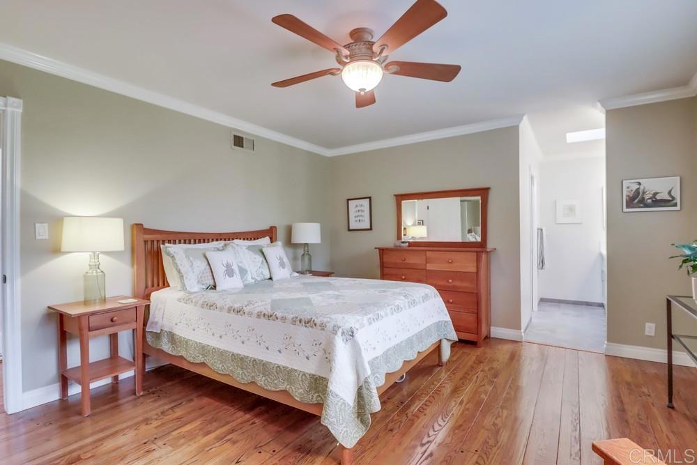 1601 Hidden Mesa Road El Cajon, CA 92019 - Photo 14 of 31 a bedroom with a bed and wooden floor