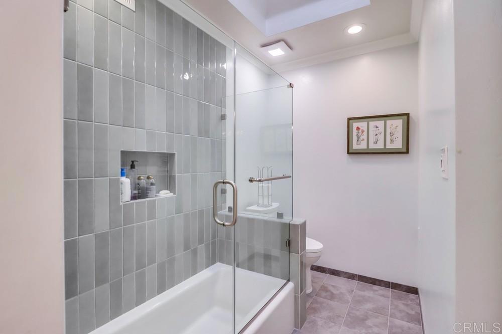 1601 Hidden Mesa Road El Cajon, CA 92019 - Photo 16 of 31 a bathroom with a bathtub and a shower