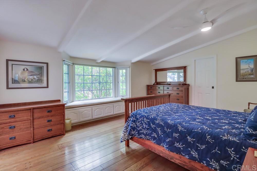 1601 Hidden Mesa Road El Cajon, CA 92019 - Photo 17 of 31 a spacious bedroom with a bed and a dresser