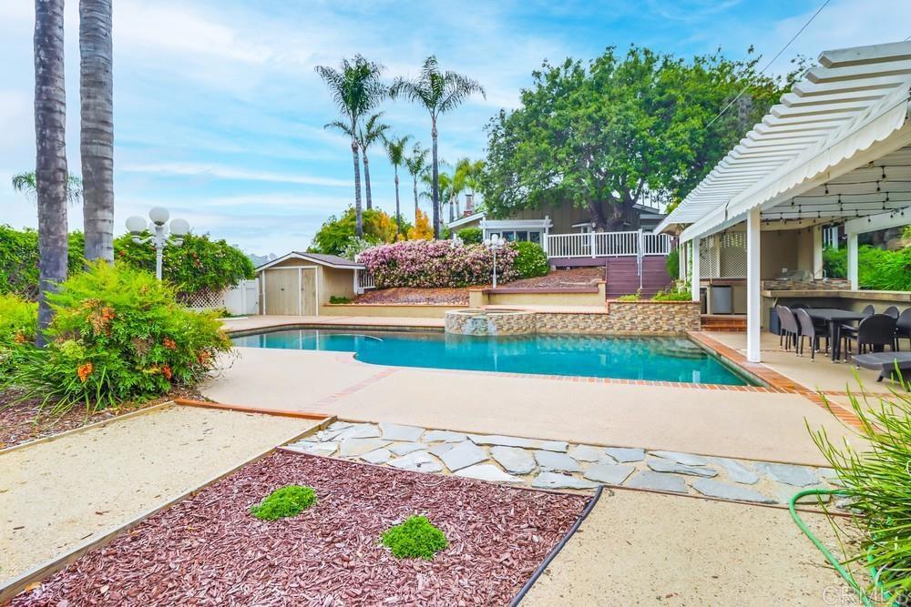 1601 Hidden Mesa Road El Cajon, CA 92019 - Photo 24 of 31 a house with lots of garden in front of it