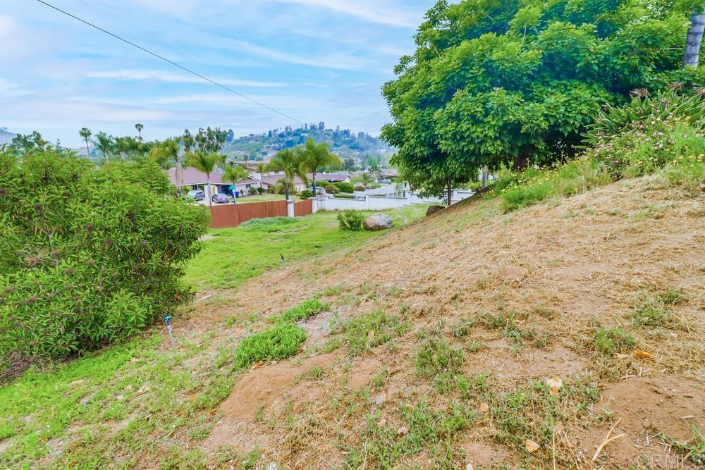 1601 Hidden Mesa Road El Cajon, CA 92019 - Photo 31 of 31 a view of a city street from a bench