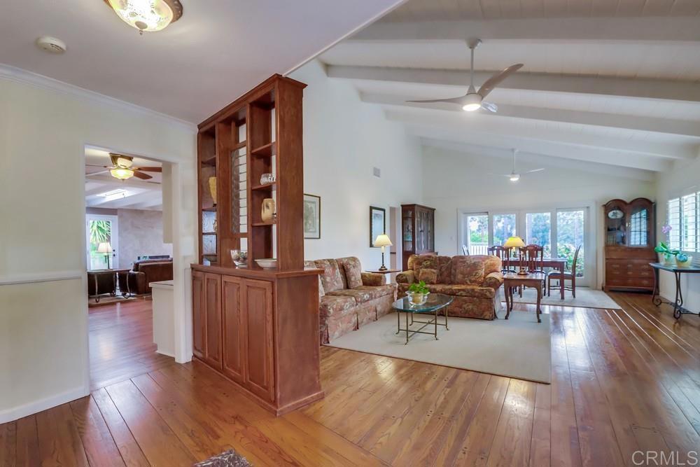 1601 Hidden Mesa Road El Cajon, CA 92019 - Photo 8 of 31 a living room with furniture and wooden floor