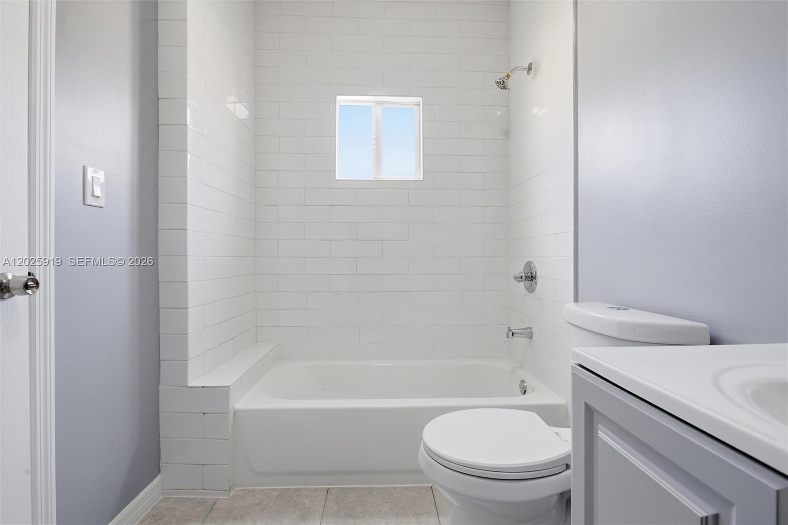 1743 Southwest 17th Street, Unit 1 Miami, FL 33145 - Photo 21 of 32 a bathroom with a toilet and a bath tub